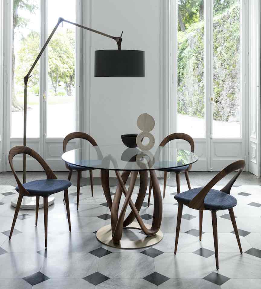 contemporary glass dining table make a space feel larger